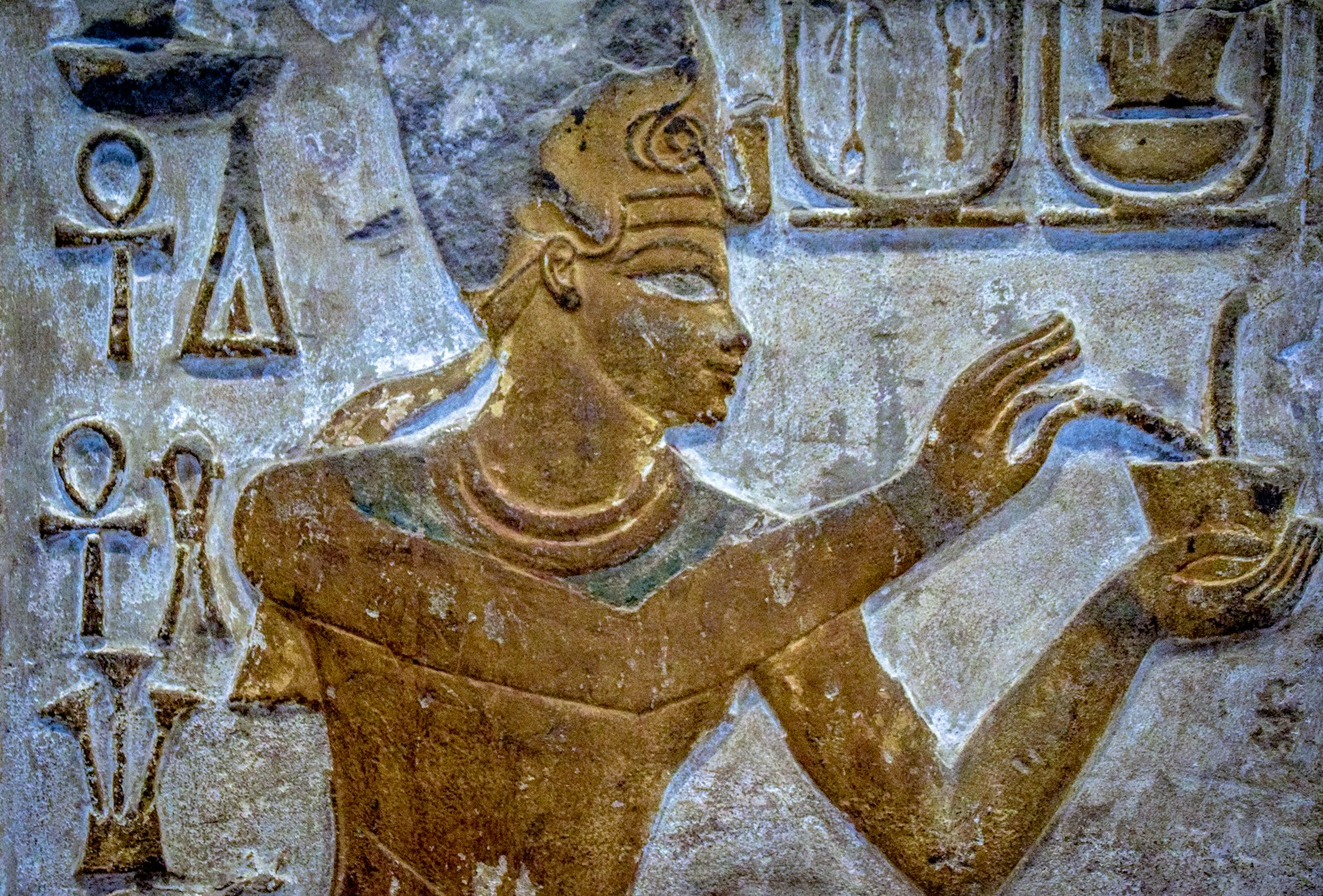 Hieroglyphic relief carving of a pharaoh with Ankh symbols